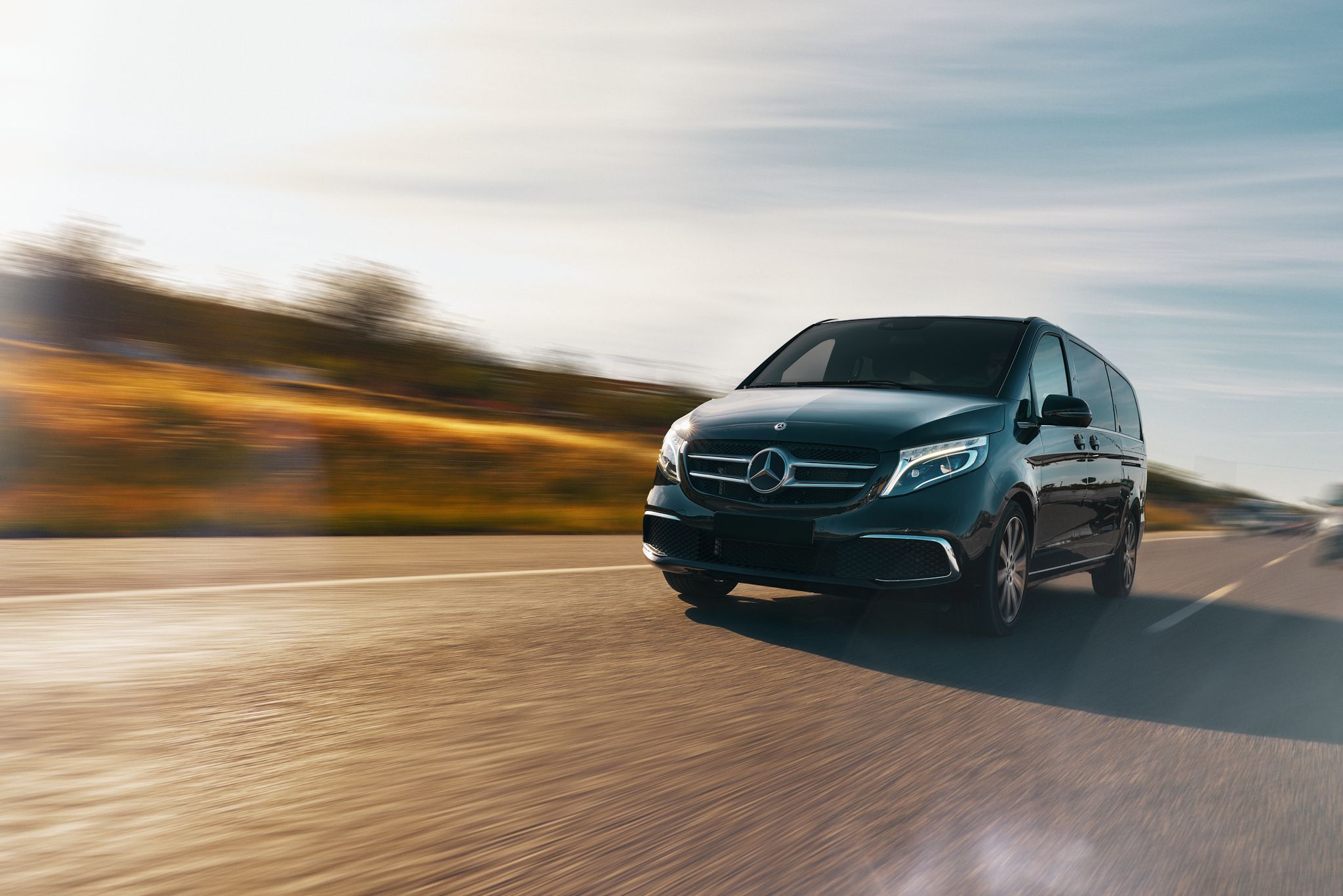 Luxury Mercedes V-Class on a scenic Mallorca road with Mediterranean views